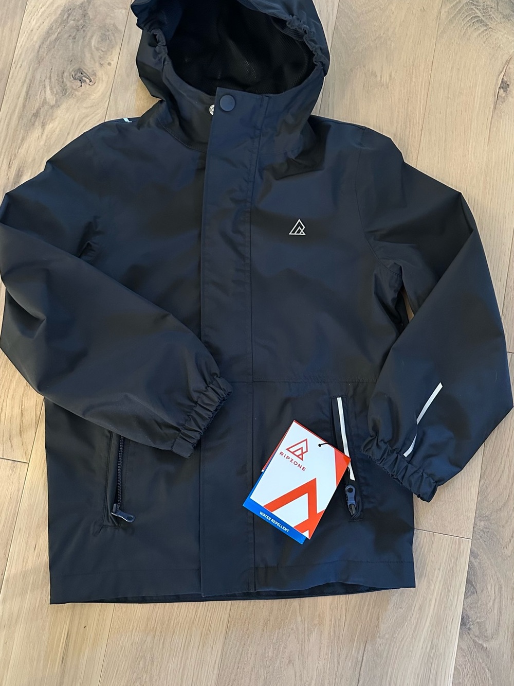 Kids Black Waterproof Hooded Raincoat by Ripzone